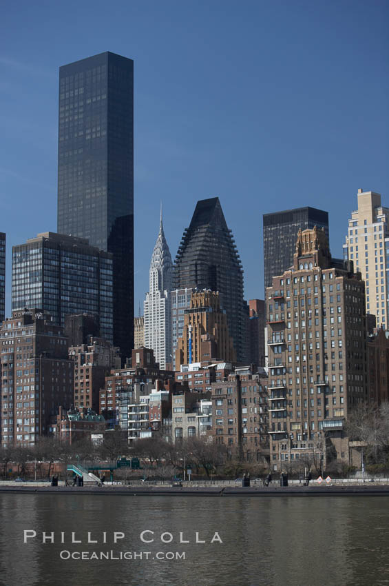 New York Citys Upper East Side, viewed from the East River. The Trump World Tower rises in the background and, in the distance, the Chrysler Building. Manhattan, USA, natural history stock photograph, photo id 11138