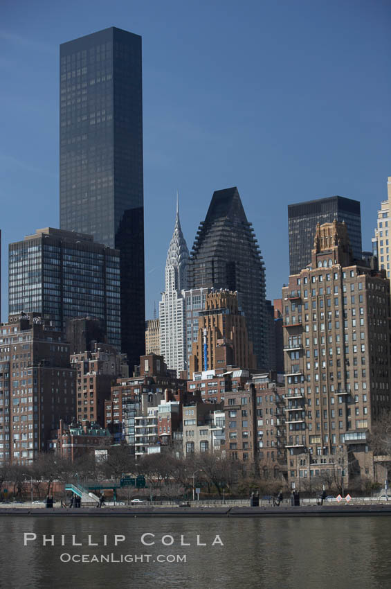 New York Citys Upper East Side, viewed from the East River. The Trump World Tower rises in the background and, in the distance, the Chrysler Building. Manhattan, USA, natural history stock photograph, photo id 11139