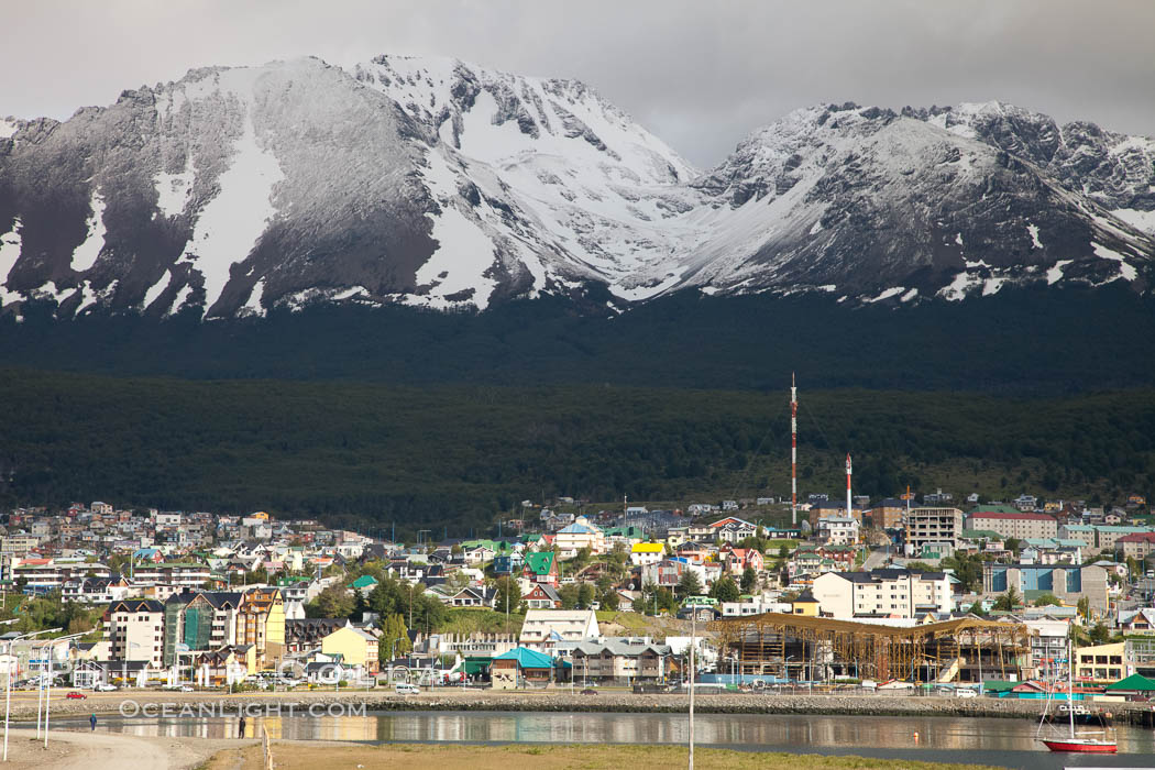 Ushuaia, the southernmost city in the world, lies on the Beagle Channel with a small portion of the Andes mountain range rising above.  Ushuaia is the capital of the Tierra del Fuego region of Argentina and the gateway port for many expeditions to Antarctica., natural history stock photograph, photo id 23604