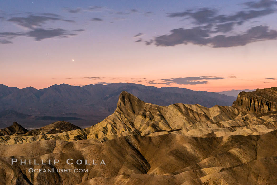 Venus sets over Manley Beacon and the Panamint Mountains, viewed from Zabriskie Point, landscape lit by a full moon, evening, stars. Death Valley National Park, California, USA, natural history stock photograph, photo id 28677