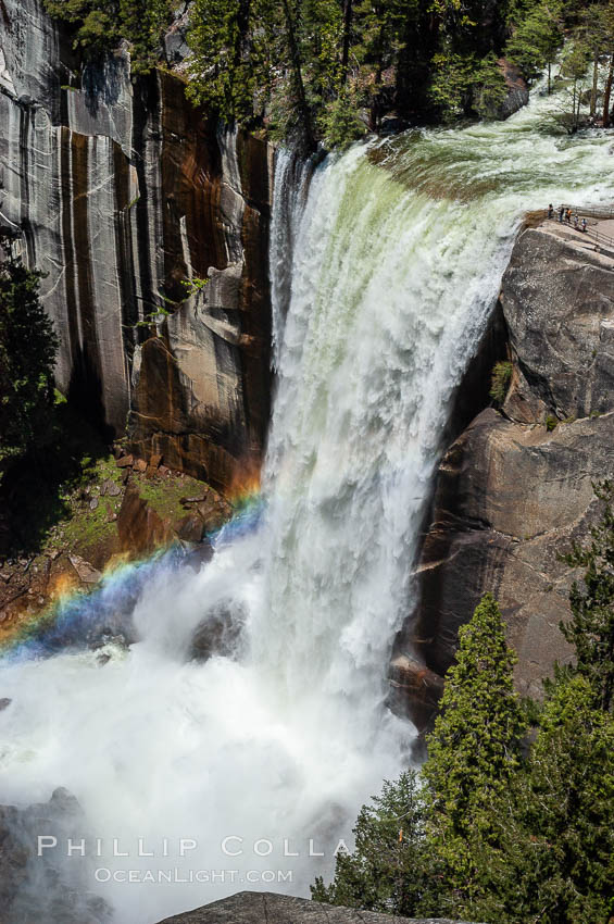 Vernal Falls at peak flow in late spring, hikers visible at precipice, viewed from John Muir Trail. Yosemite National Park, California, USA, natural history stock photograph, photo id 07141