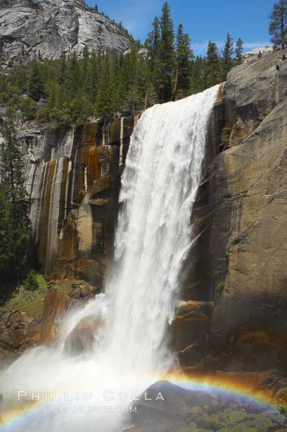Vernal Falls at peak flow in late spring, with a rainbow appearing in the spray of the falls, viewed from the Mist Trail. Yosemite National Park, California, USA, natural history stock photograph, photo id 12643