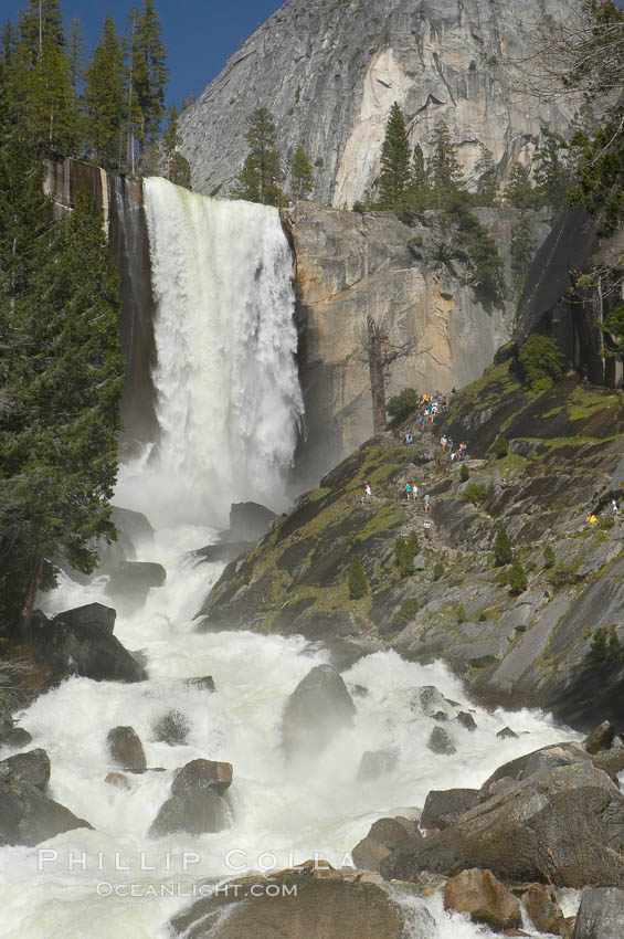 Vernal Falls and the Merced River, at peak flow in late spring.  Hikers ascending the Mist Trail visible at right.  Vernal Falls drops 317 through a joint in the narrow Little Yosemite Valley. Yosemite National Park, California, USA, natural history stock photograph, photo id 16109