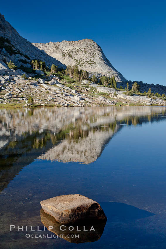 Vogelsang Peak (11500') and the shoulder of Fletcher Peak, reflected in the still morning waters of Fletcher Lake, in Yosemite's gorgeous high country, late summer. Yosemite National Park, California, USA, natural history stock photograph, photo id 25789