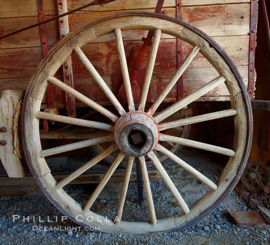 Wagon wheel, in County Barn. Bodie State Historical Park, California, USA, natural history stock photograph, photo id 23154