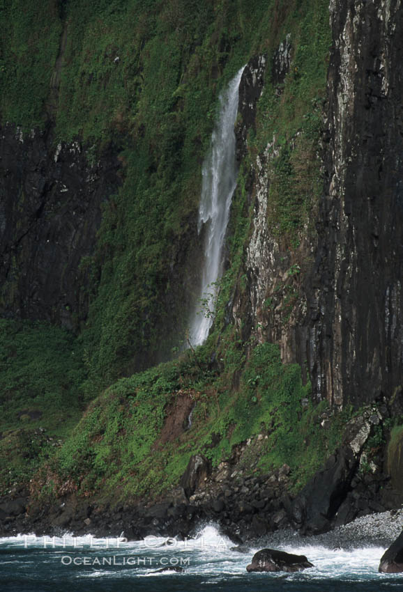 Shoreline waterfall. Cocos Island, Costa Rica, natural history stock photograph, photo id 05805