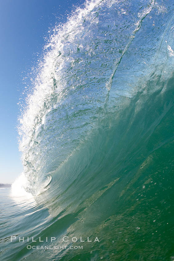 Cresting wave, morning light, glassy water, surf., natural history stock photograph, photo id 20819