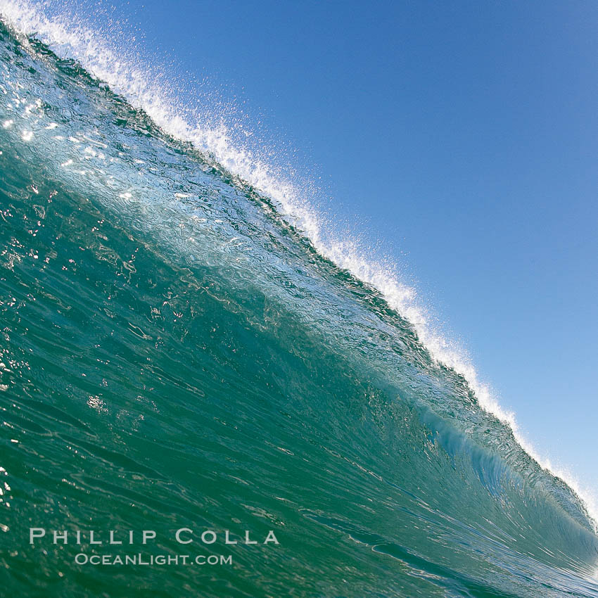 Cresting wave, morning light, glassy water, surf., natural history stock photograph, photo id 20823