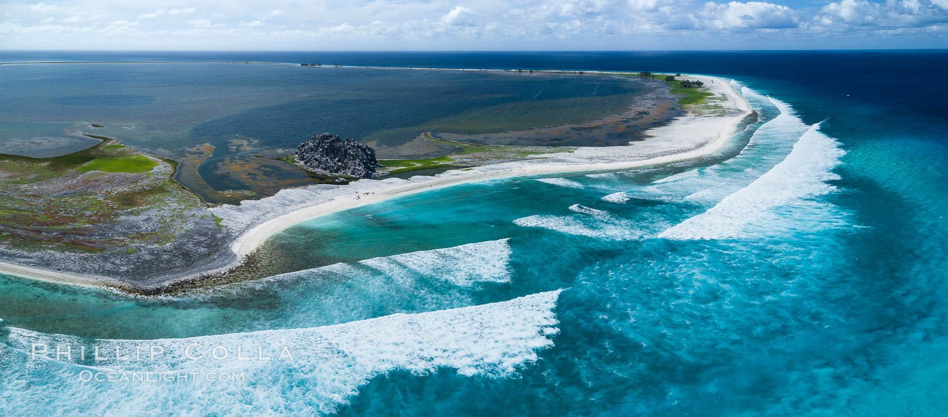Waves break on the coral reef and wash ashore at Clipperton Island, aerial photo. Clipperton Island, a minor territory of France also known as Ile de la Passion, is a spectacular coral atoll in the eastern Pacific. By permit HC / 1485 / CAB (France)., natural history stock photograph, photo id 32925