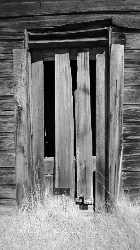 Weathered and broken old door, Kelley Building on Green Street. Bodie State Historical Park, California, USA, natural history stock photograph, photo id 23171