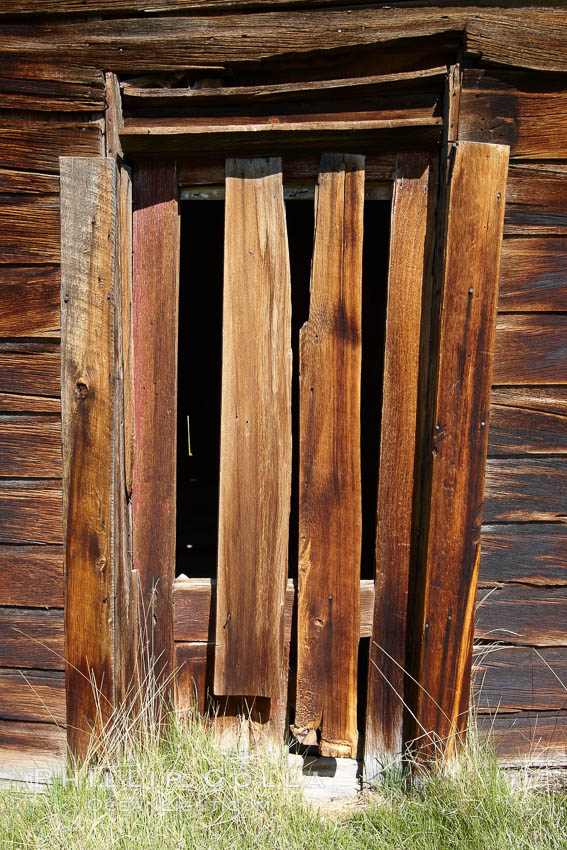 Weathered and broken old door, Kelley Building on Green Street. Bodie State Historical Park, California, USA, natural history stock photograph, photo id 23109