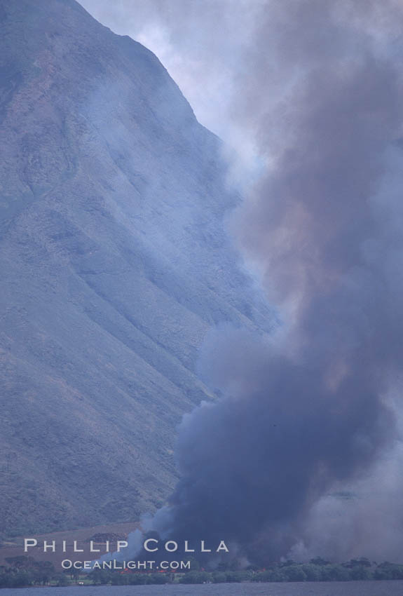 West Maui and smoke from burning cut sugar cane. Hawaii, USA, natural history stock photograph, photo id 04549