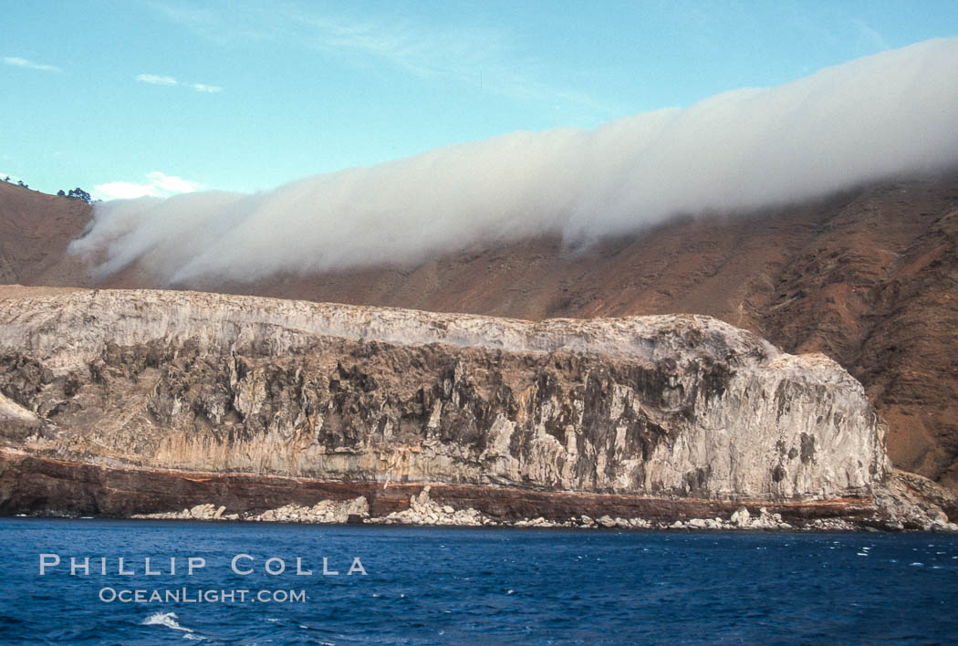 Clouds held back by island crest. Guadalupe Island (Isla Guadalupe), Baja California, Mexico, natural history stock photograph, photo id 03710