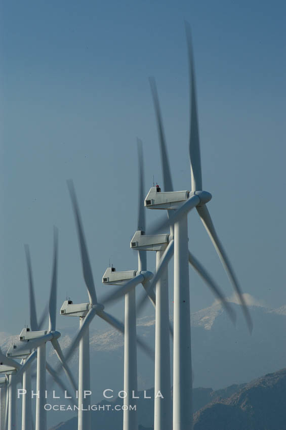 Image 06854, Wind turbines provide electricity to Palm Springs and the Coachella Valley. San Gorgonio pass, San Bernardino mountains. San Gorgonio Pass, California, USA, Phillip Colla, all rights reserved worldwide. Keywords: california, coachella valley, desert, electricity, energy, palm springs, power generation, san gorgonio pass, san gorgonio pass wind farm, science and technology, usa, wind farm, wind power, wind turbine, windmill.