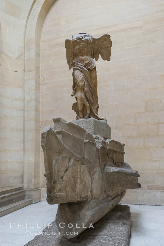 The Winged Victory of Samothrace, also called the Nike of Samothrace, is a 2nd century BC marble sculpture of the Greek goddess Nike (Victory). The Nike of Samothrace, discovered in 1863, is estimated to have been created around 190 BC. Musee du Louvre, Paris, France, natural history stock photograph, photo id 28103