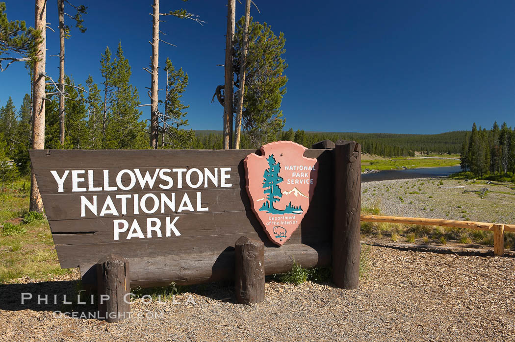 Yellowstone National Park, entrance sign at southern entrance, Snake River is visible in the background. Wyoming, USA, natural history stock photograph, photo id 13463