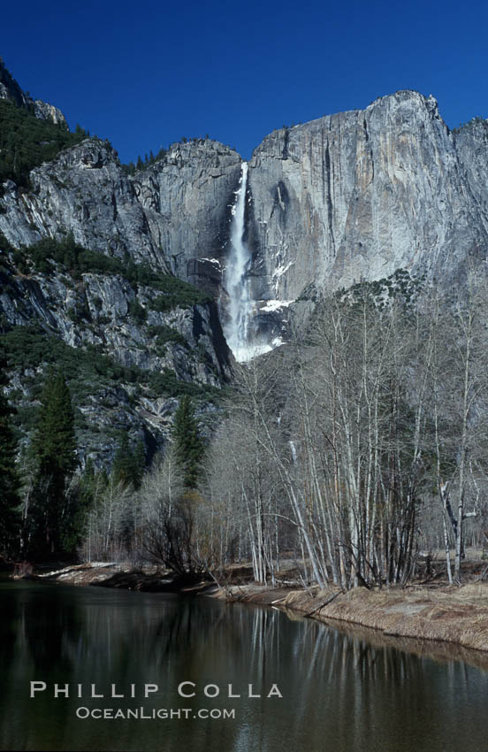 Yosemite Falls viewed from swinging bridge over Merced River, winter, Yosemite Valley. Yosemite National Park, California, USA, natural history stock photograph, photo id 07031